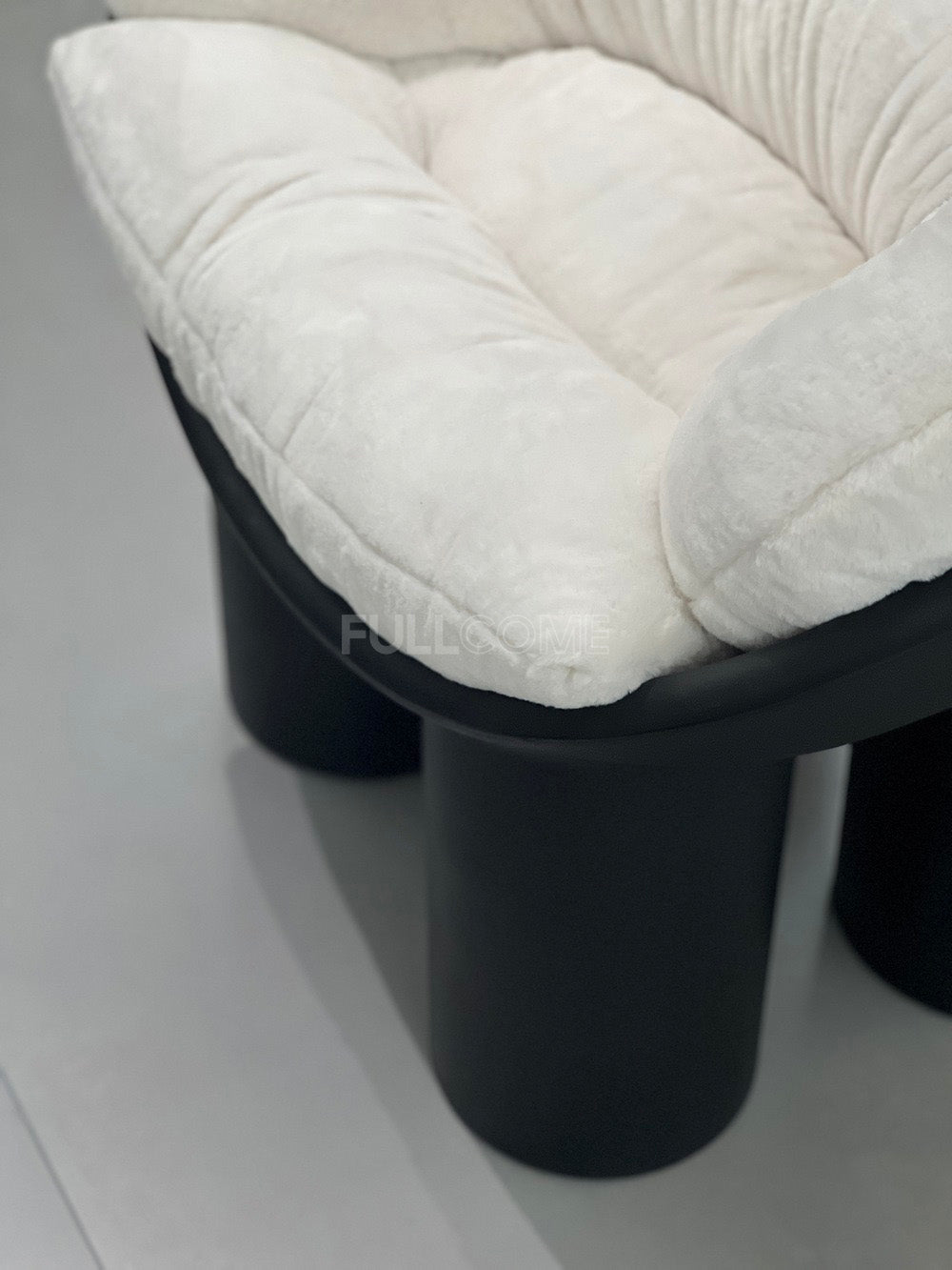 The Coil Cushion Chair