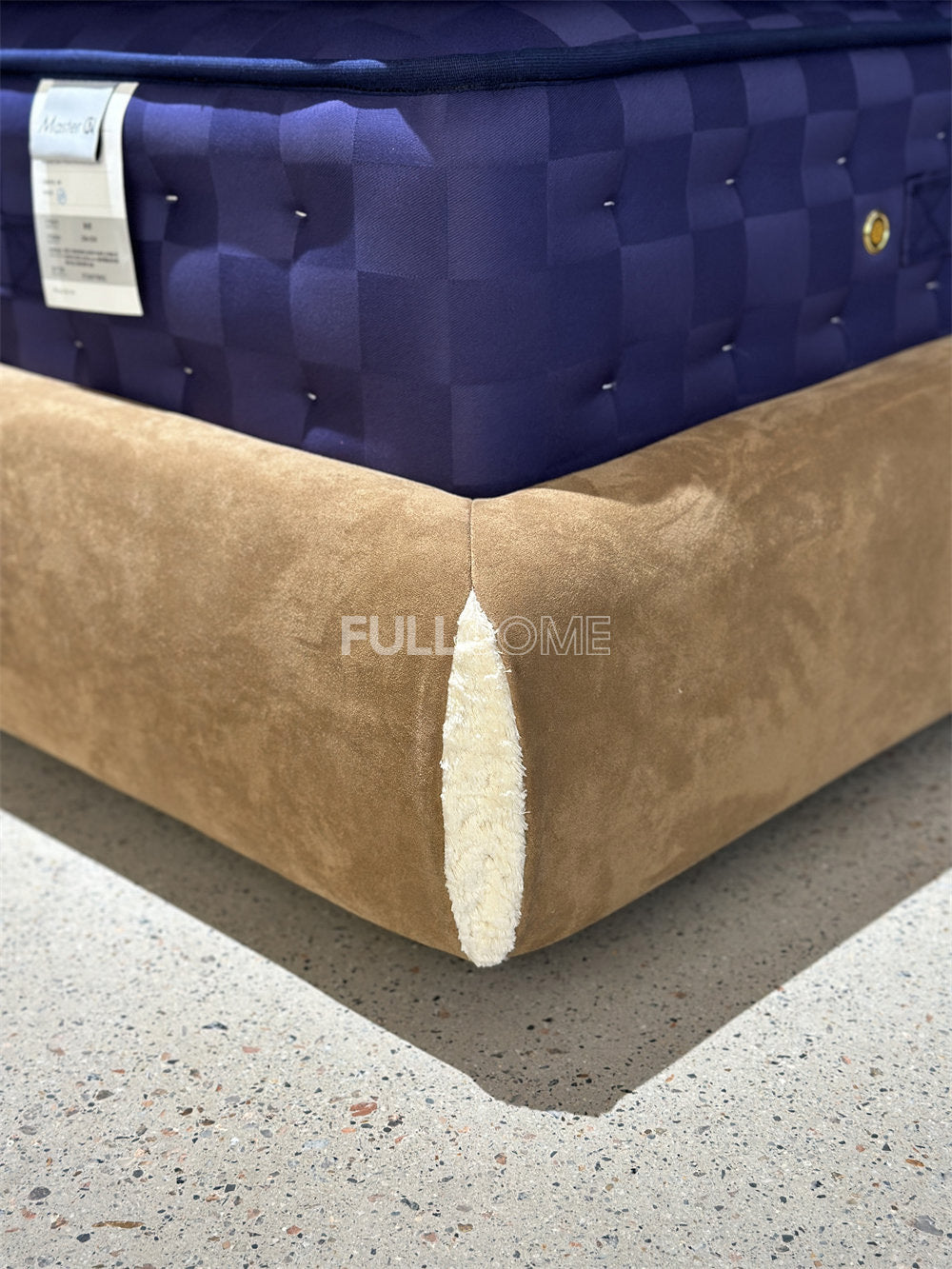 The Tufted Scroll Bed