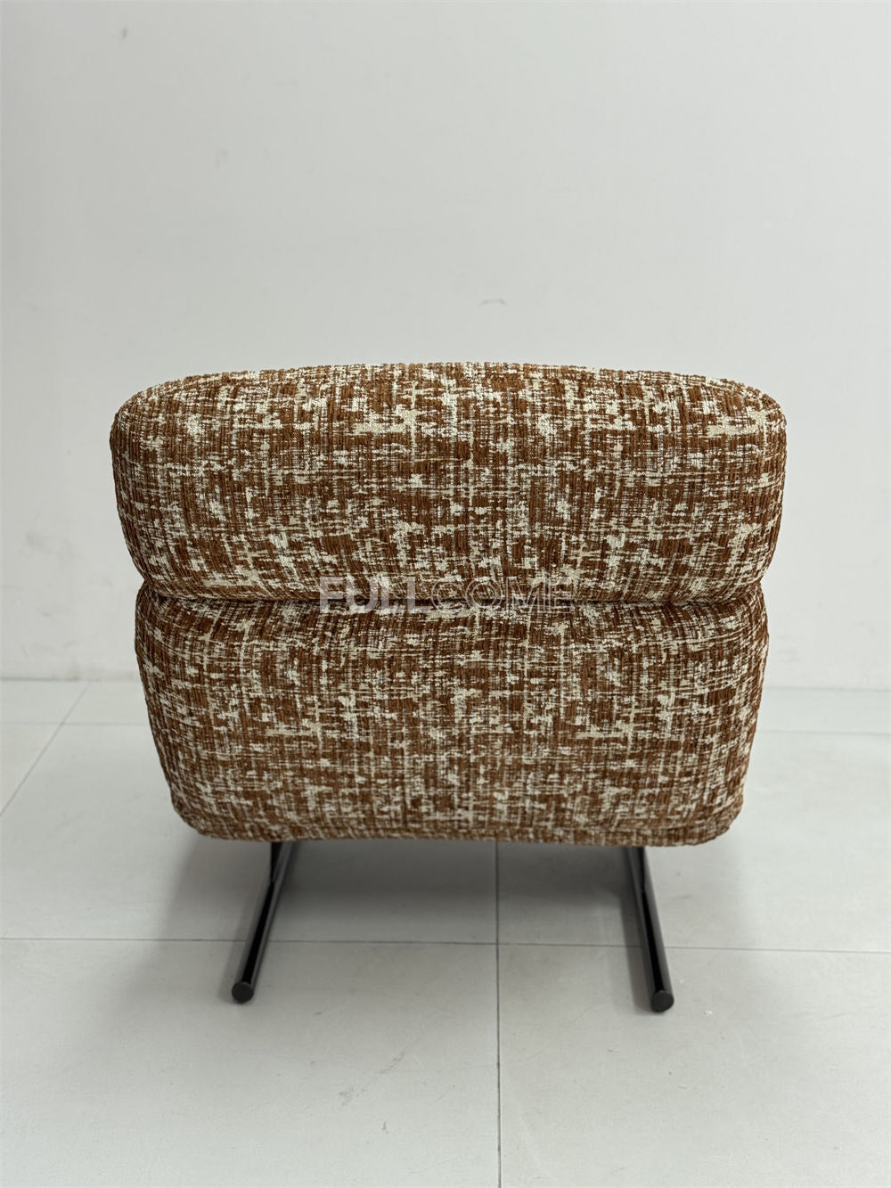 The Roll Head Lounge Chair