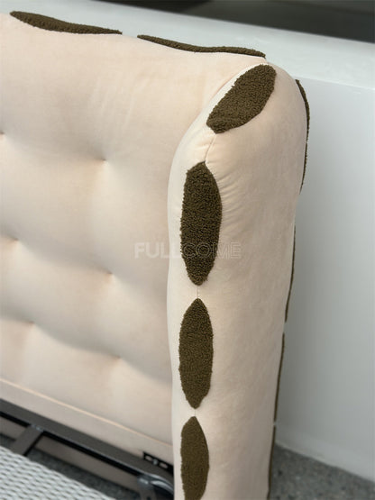 The Biscuit Tuft Bed
