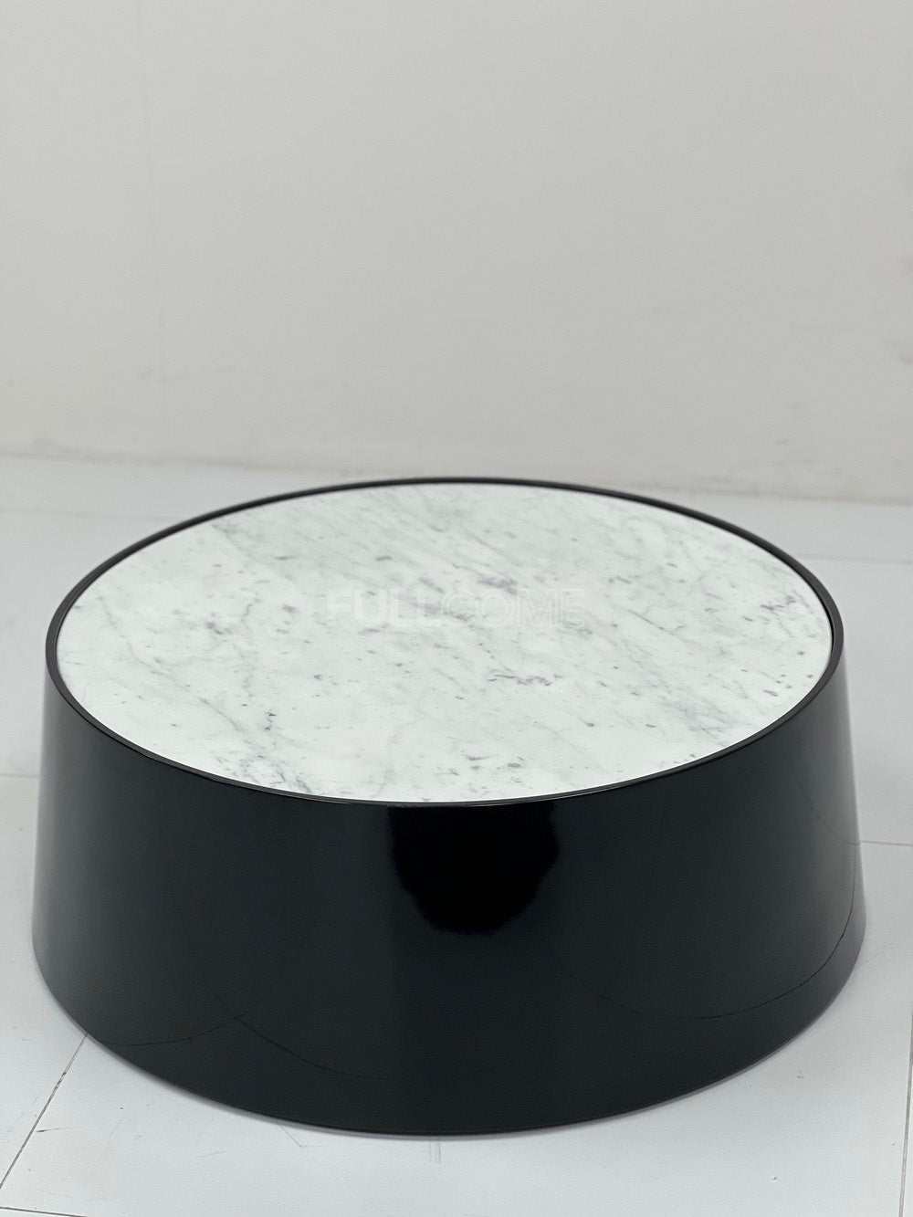 The Tapered Gloss Drum Coffee Table