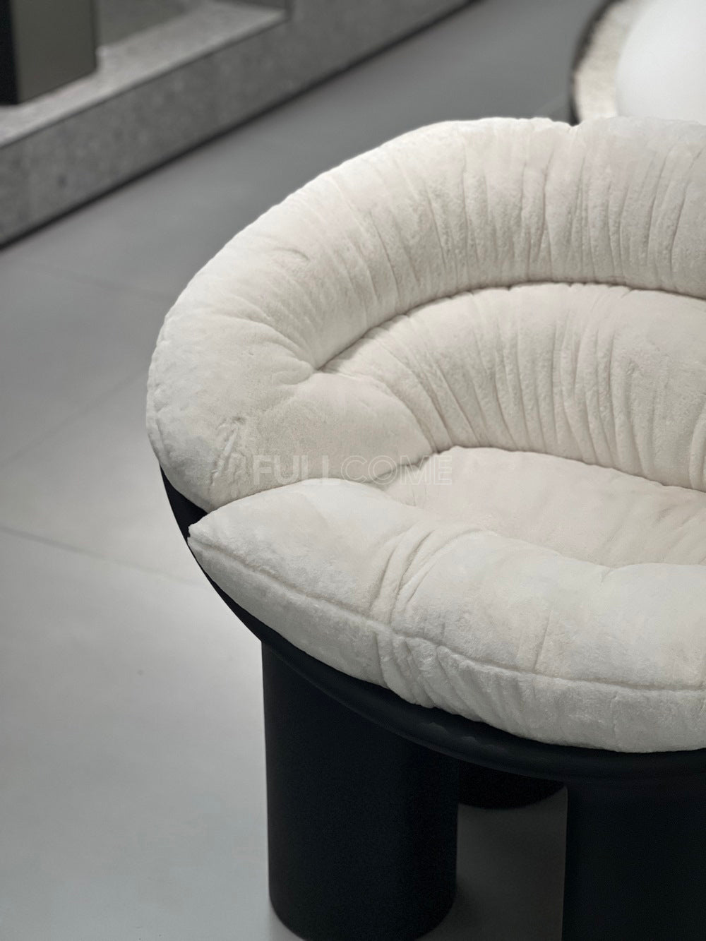 The Coil Cushion Chair