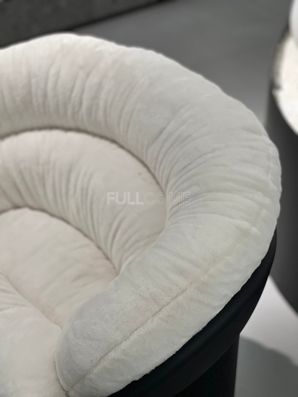 The Coil Cushion Chair