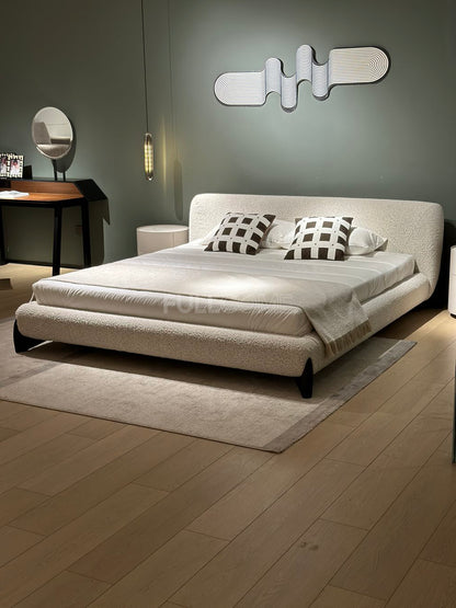 The Crescent Bolster Bed