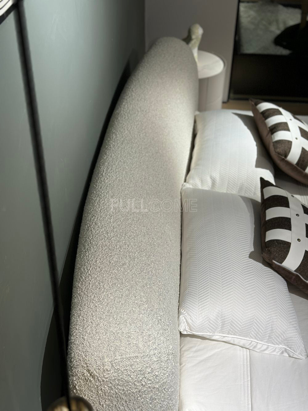 The Crescent Bolster Bed