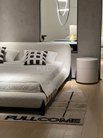 The Crescent Bolster Bed