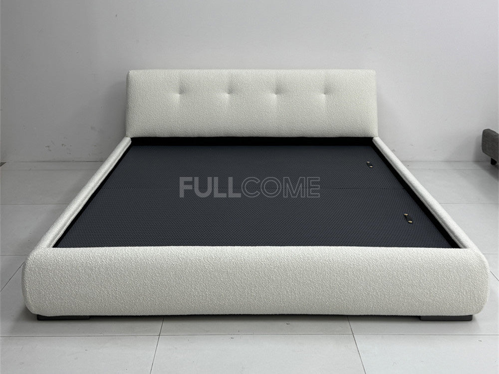 The Buttoned Boucle Platform Bed
