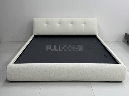 The Buttoned Boucle Platform Bed