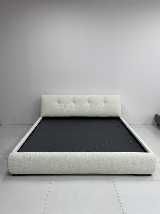 The Buttoned Boucle Platform Bed