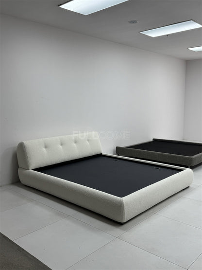 The Buttoned Boucle Platform Bed