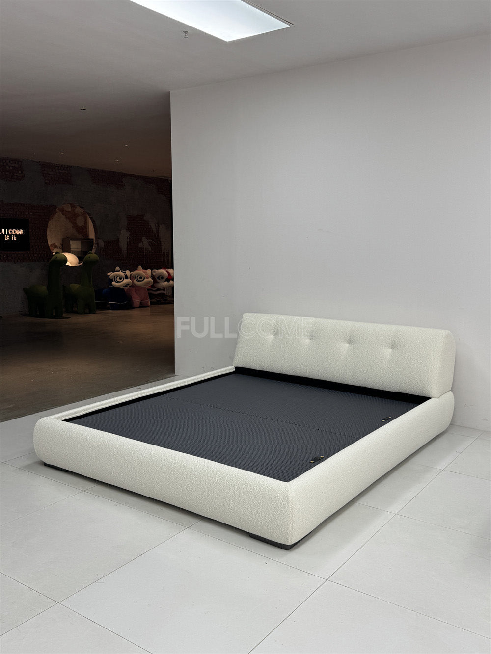 The Buttoned Boucle Platform Bed