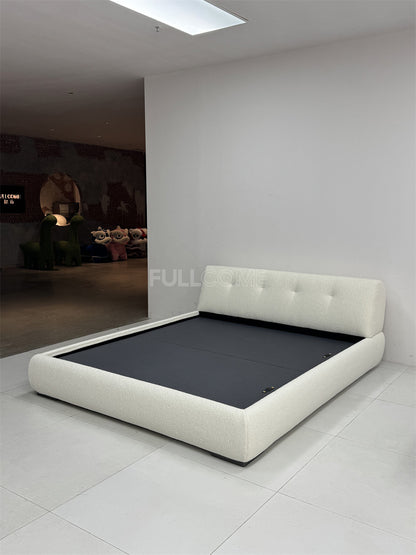 The Buttoned Boucle Platform Bed