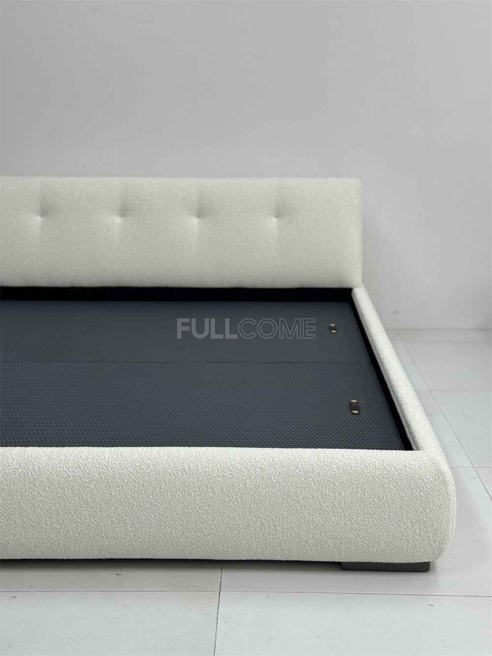 The Buttoned Boucle Platform Bed