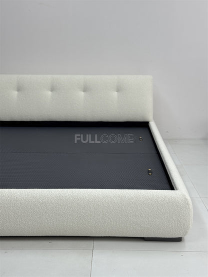 The Buttoned Boucle Platform Bed
