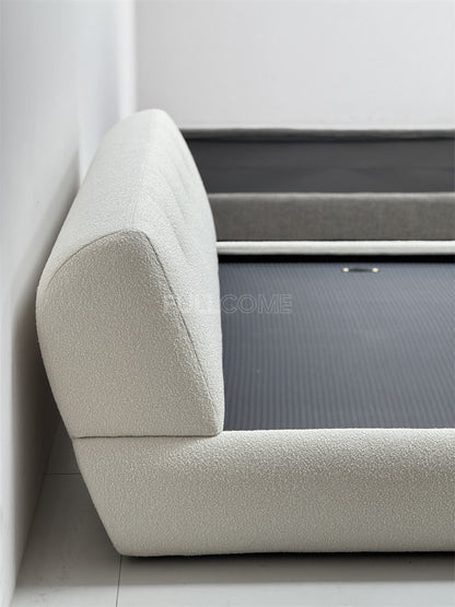 The Buttoned Boucle Platform Bed
