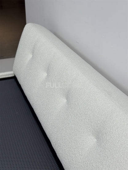 The Buttoned Boucle Platform Bed