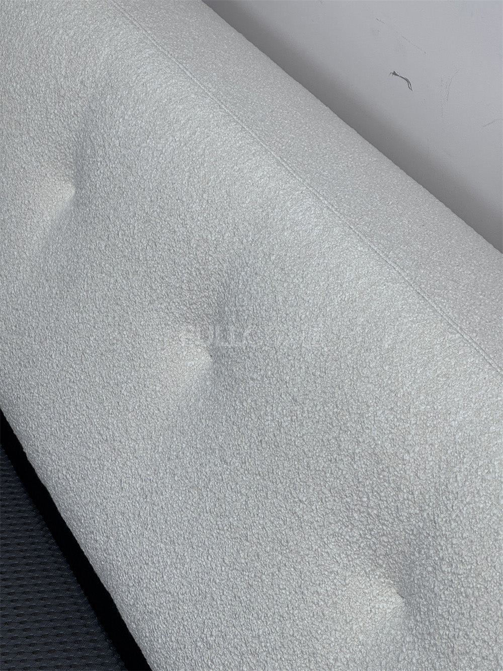The Buttoned Boucle Platform Bed