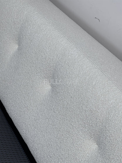 The Buttoned Boucle Platform Bed