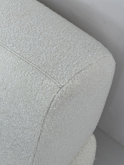 The Buttoned Boucle Platform Bed