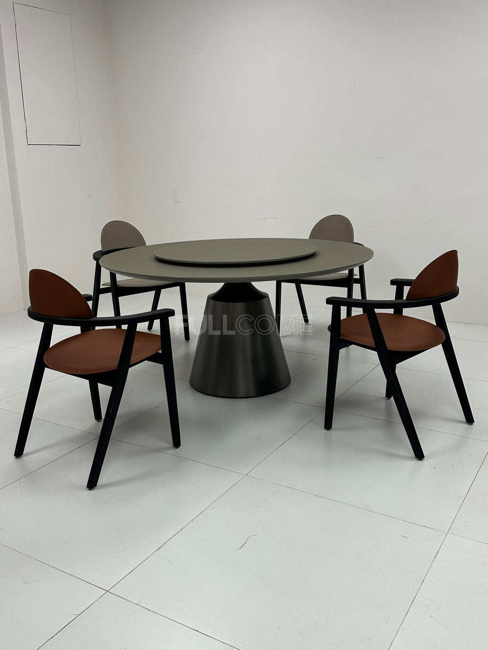 The Turntable Pedestal Dining Table