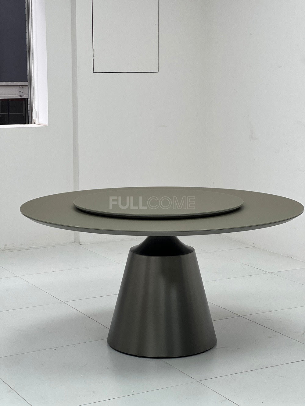 The Turntable Pedestal Dining Table