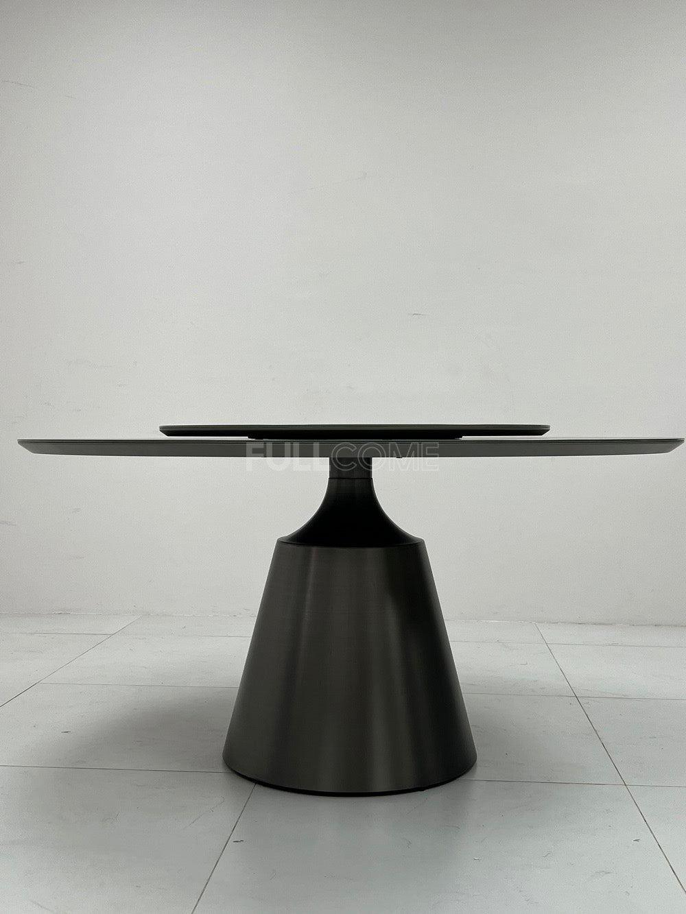 The Turntable Pedestal Dining Table