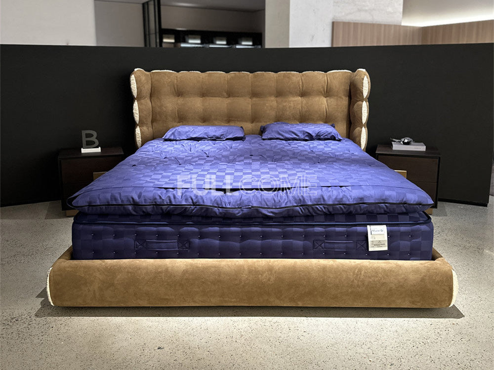 The Tufted Scroll Bed