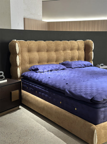 The Tufted Scroll Bed