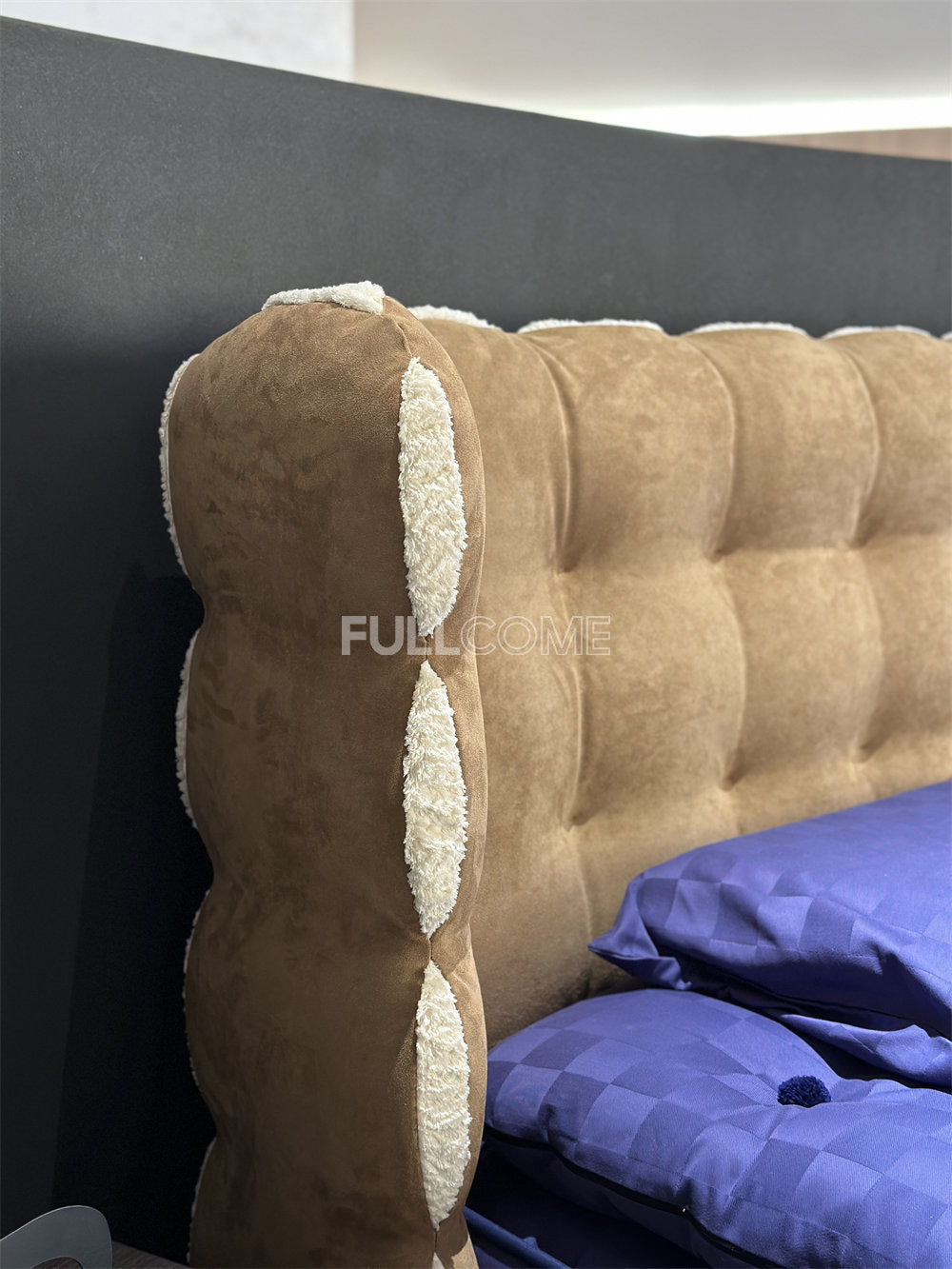 The Tufted Scroll Bed