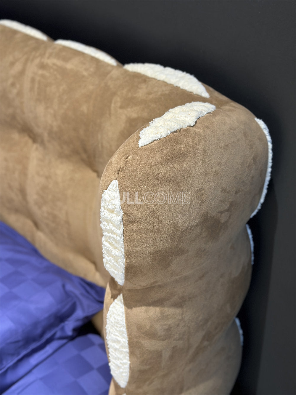 The Tufted Scroll Bed