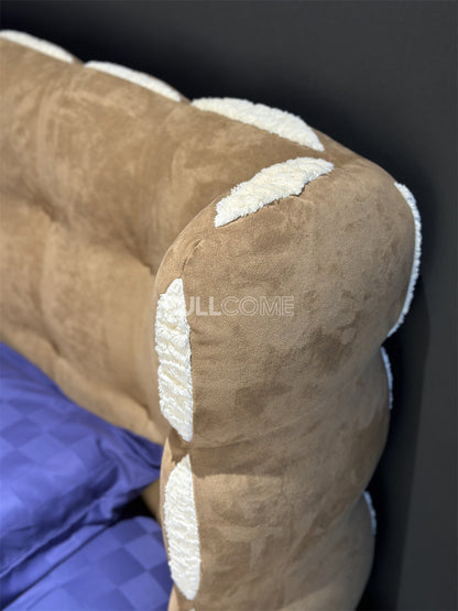 The Tufted Scroll Bed