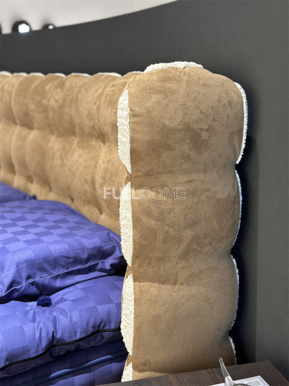The Tufted Scroll Bed
