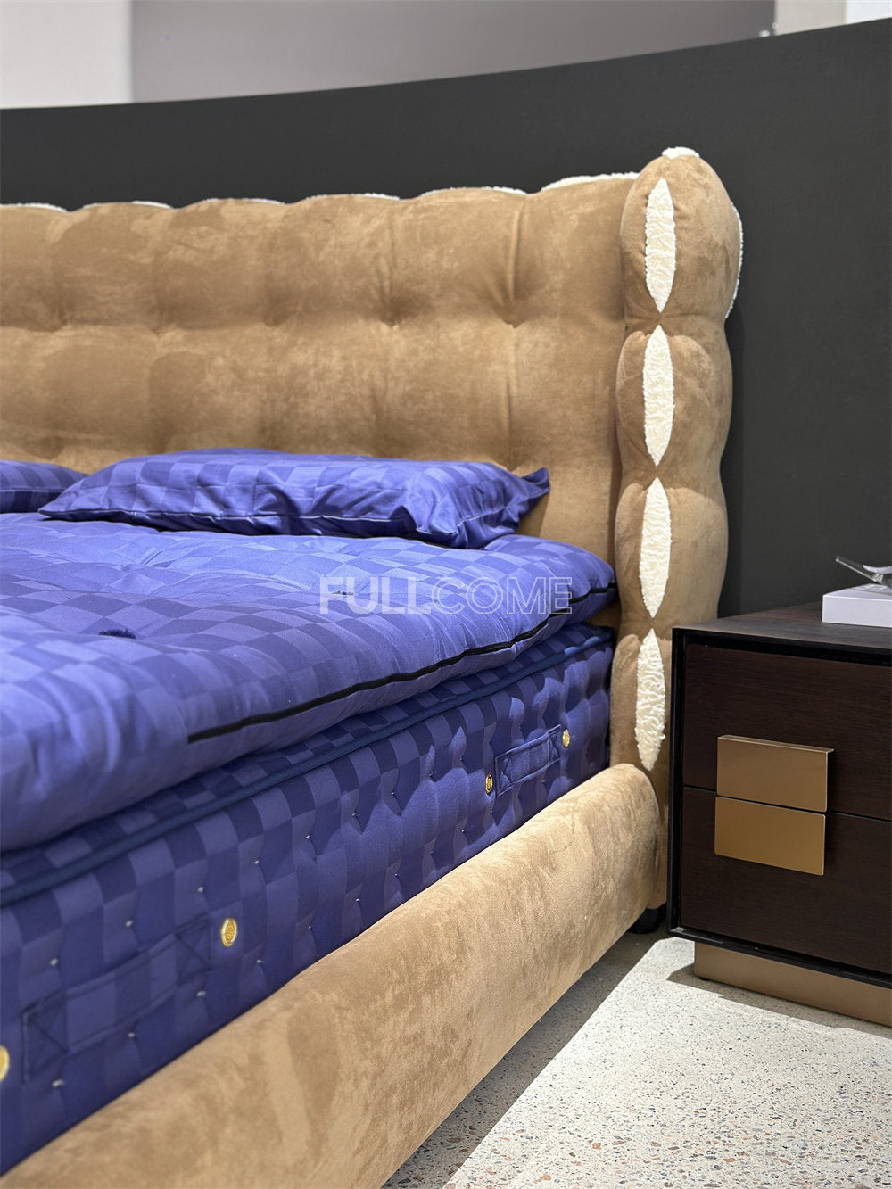 The Tufted Scroll Bed