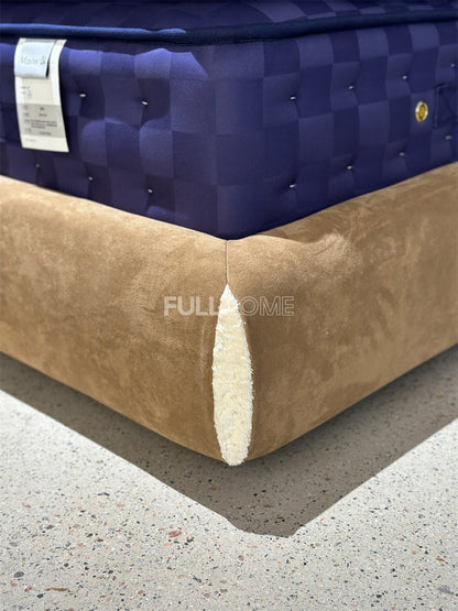 The Tufted Scroll Bed