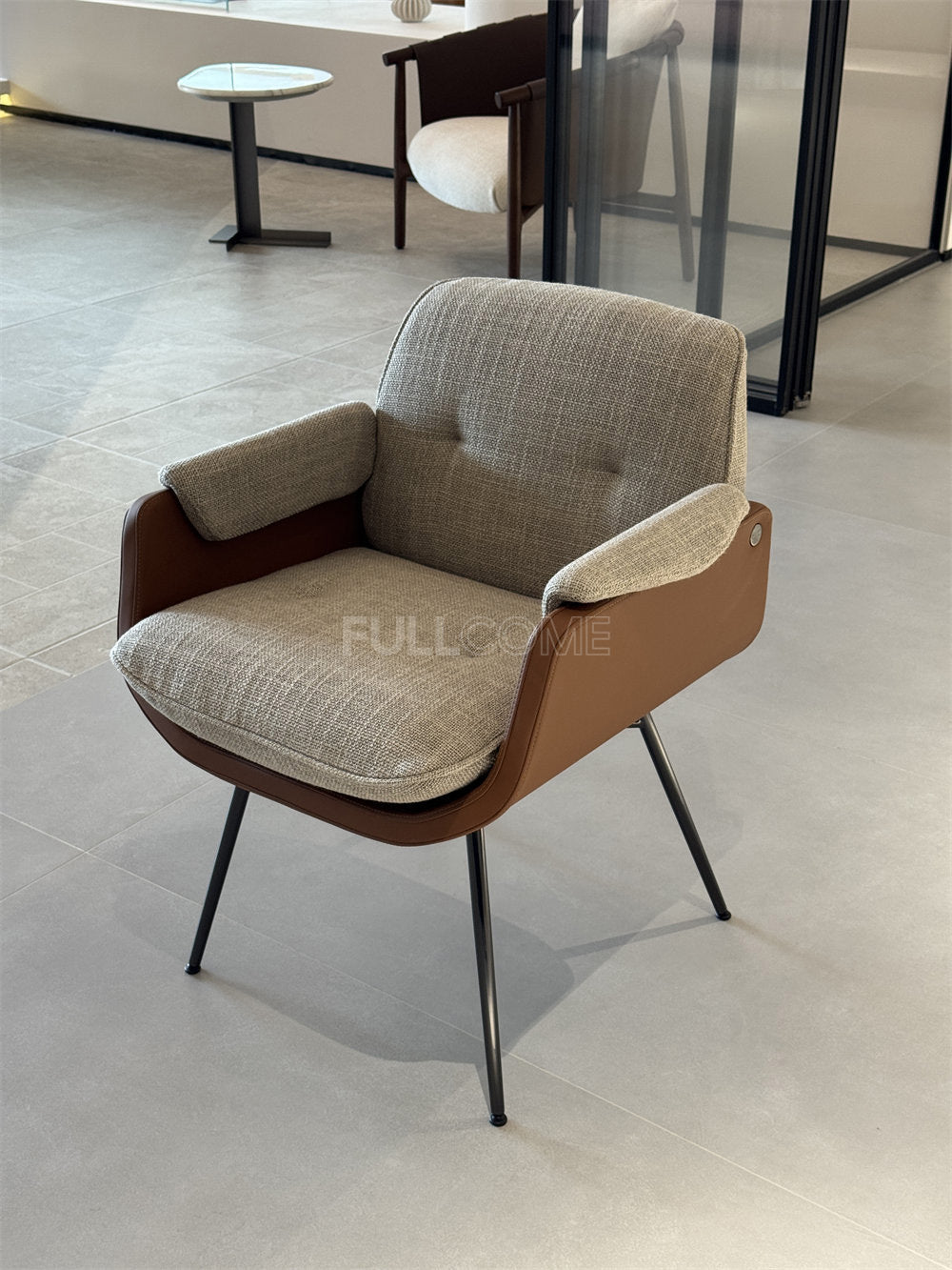 The Curved Shell Dining Armchair