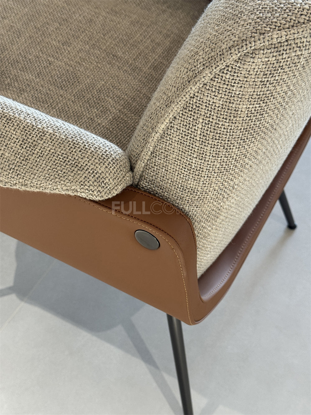 The Curved Shell Dining Armchair