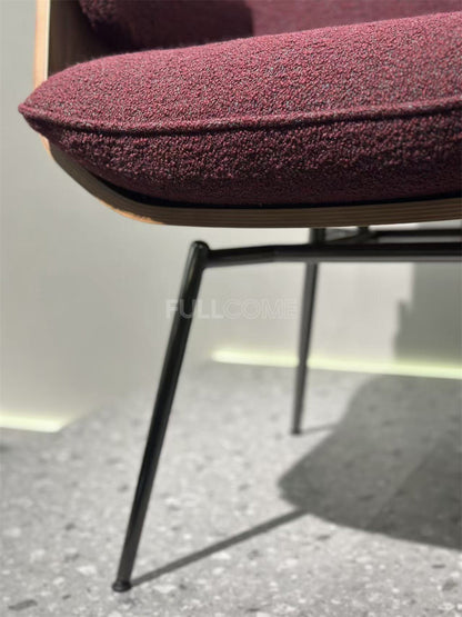 The Curved Shell Dining Armchair