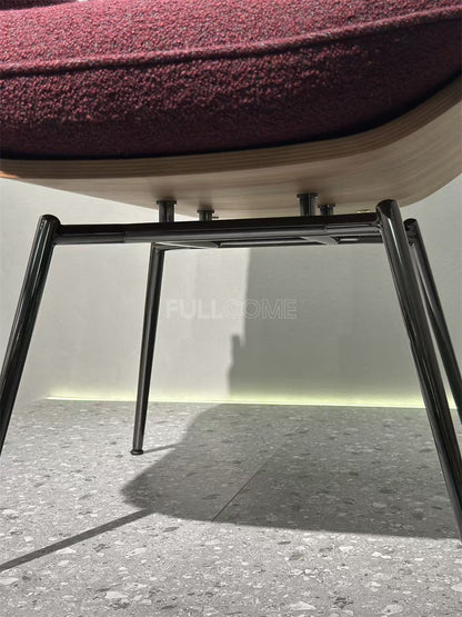 The Curved Shell Dining Armchair