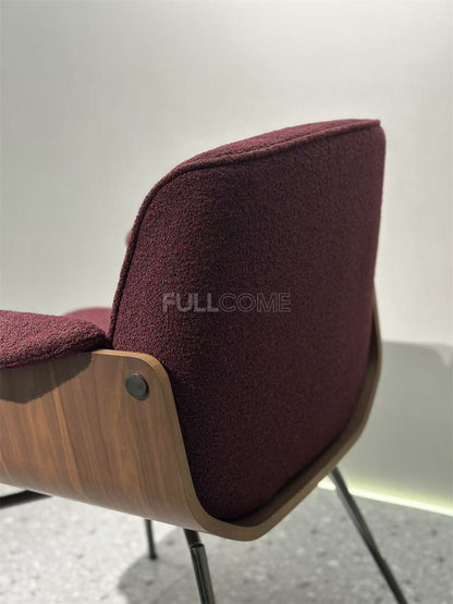 The Curved Shell Dining Armchair