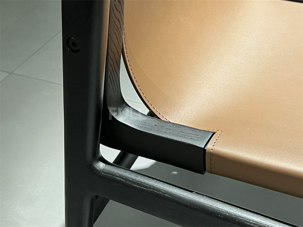 The Tan Sling Lounge Chair