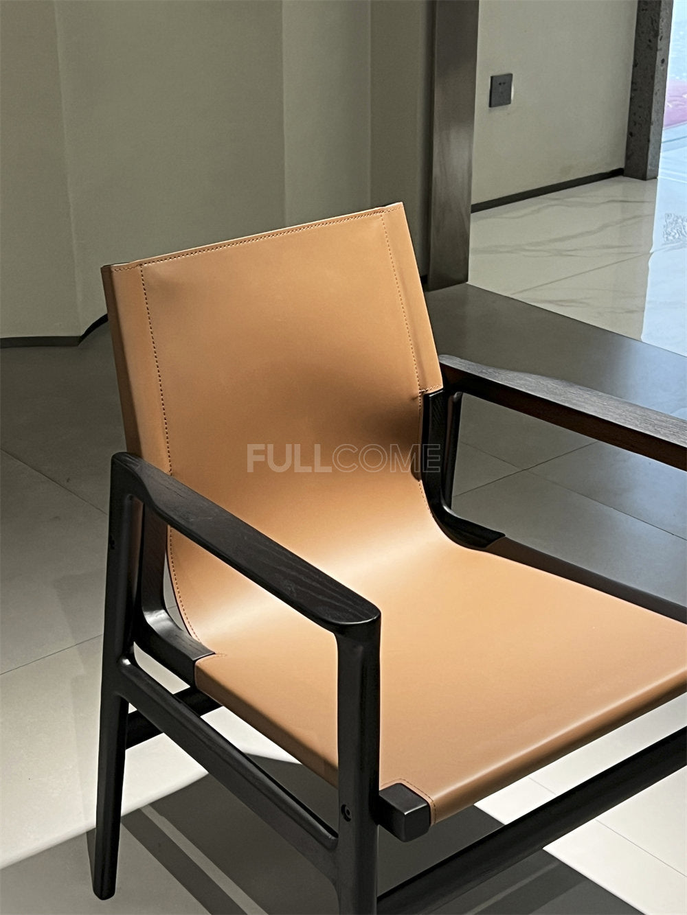 The Tan Sling Lounge Chair