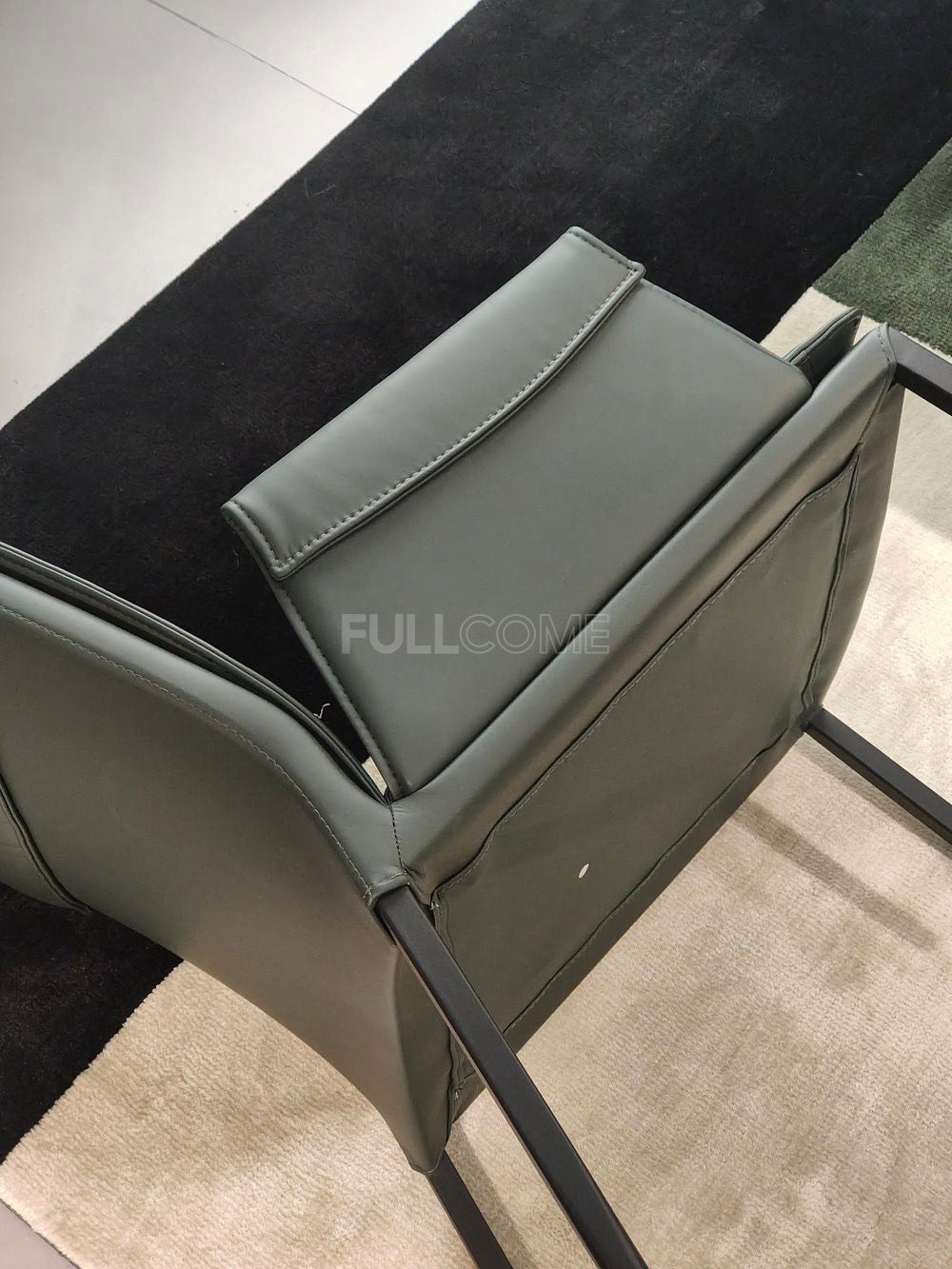 The Folded Arm Dining Chair