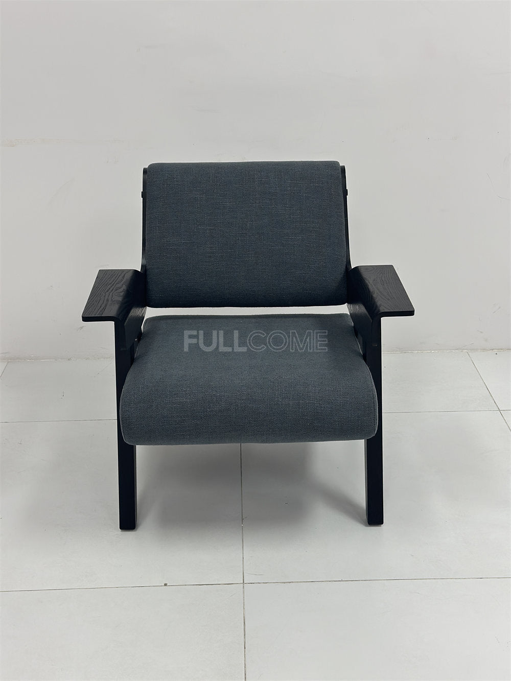 The Paddle Arm Lounge Chair