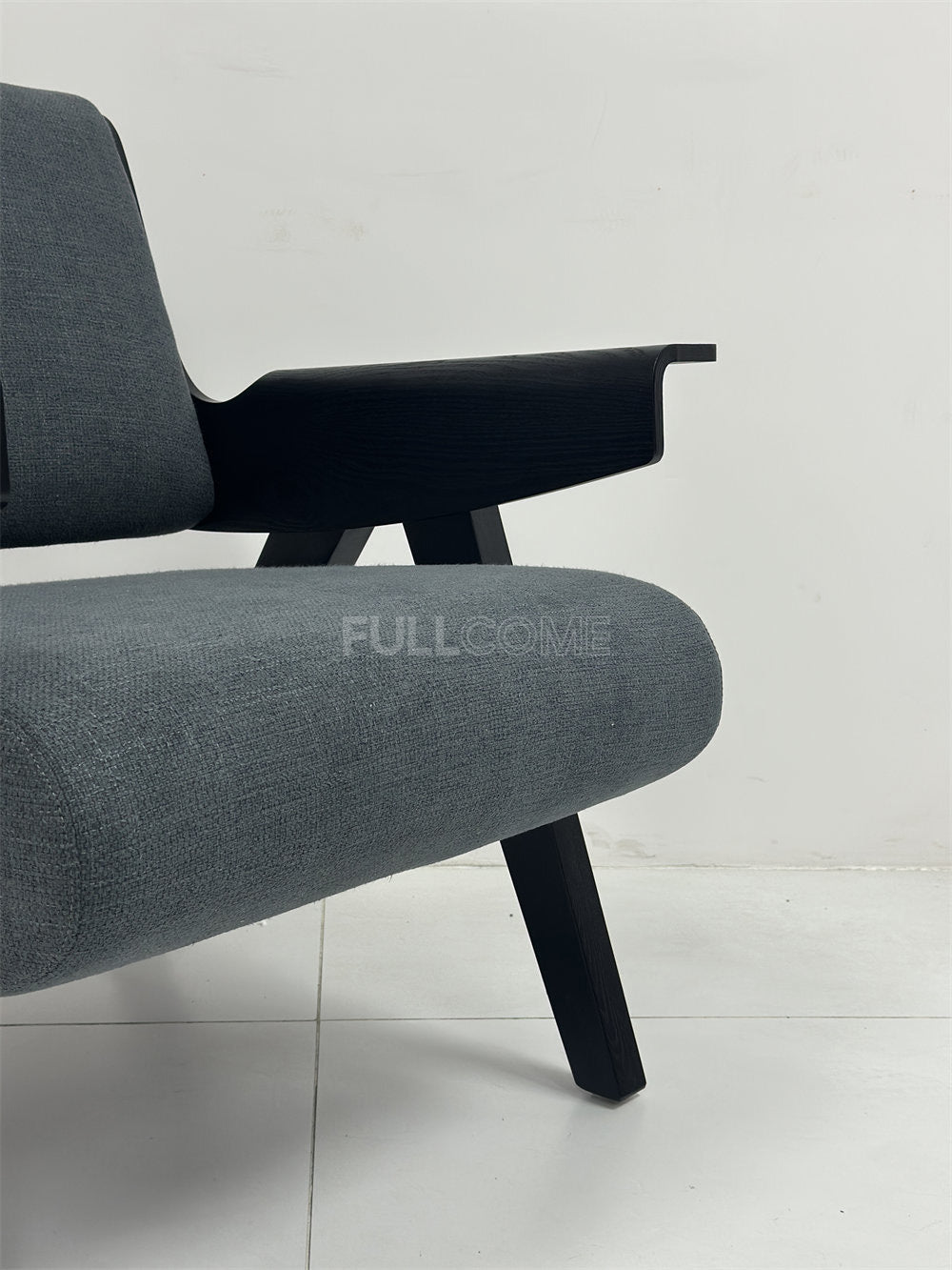The Paddle Arm Lounge Chair