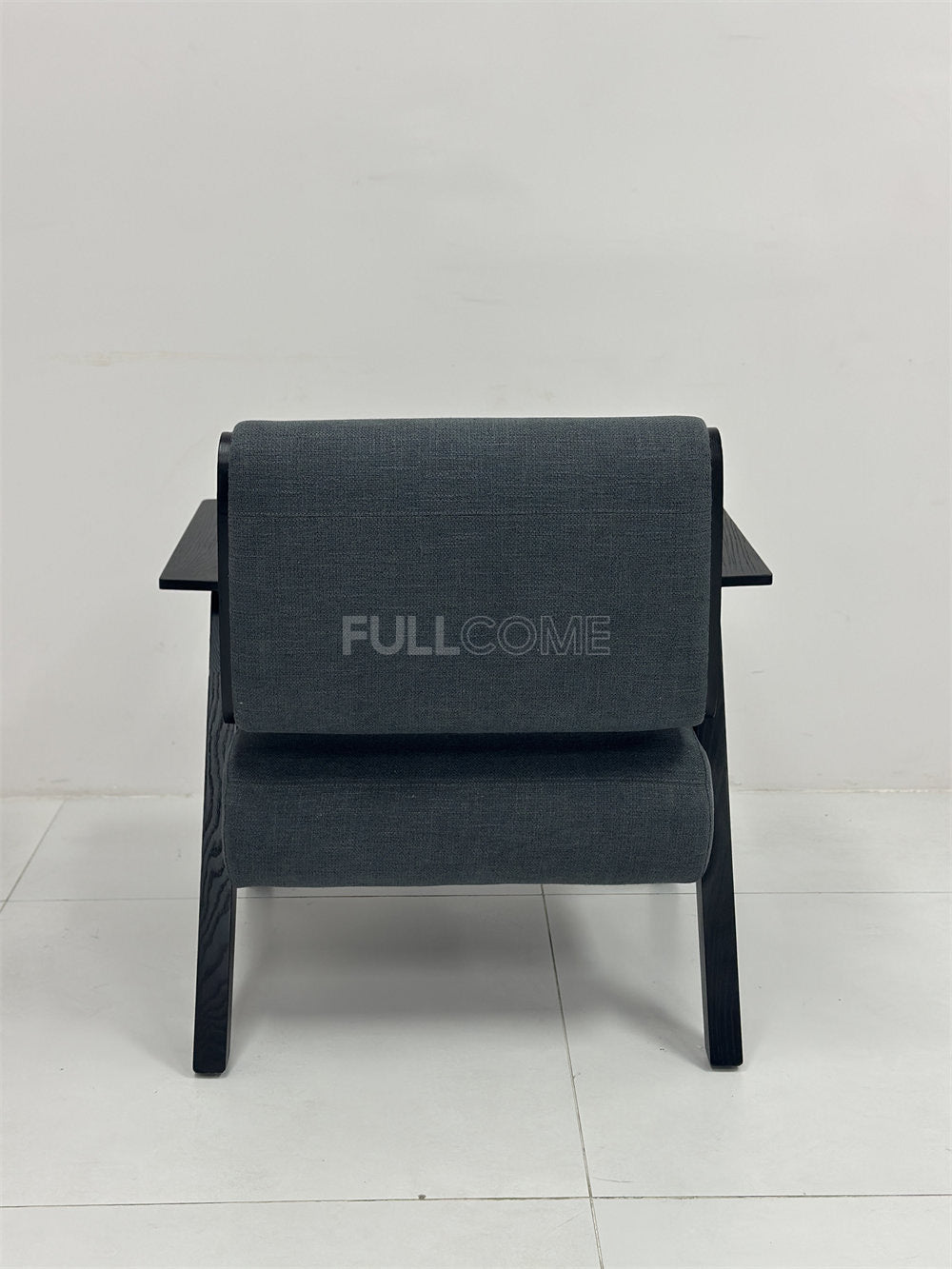 The Paddle Arm Lounge Chair