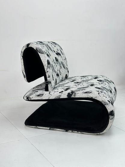 The Scroll Seat Lounge Chair