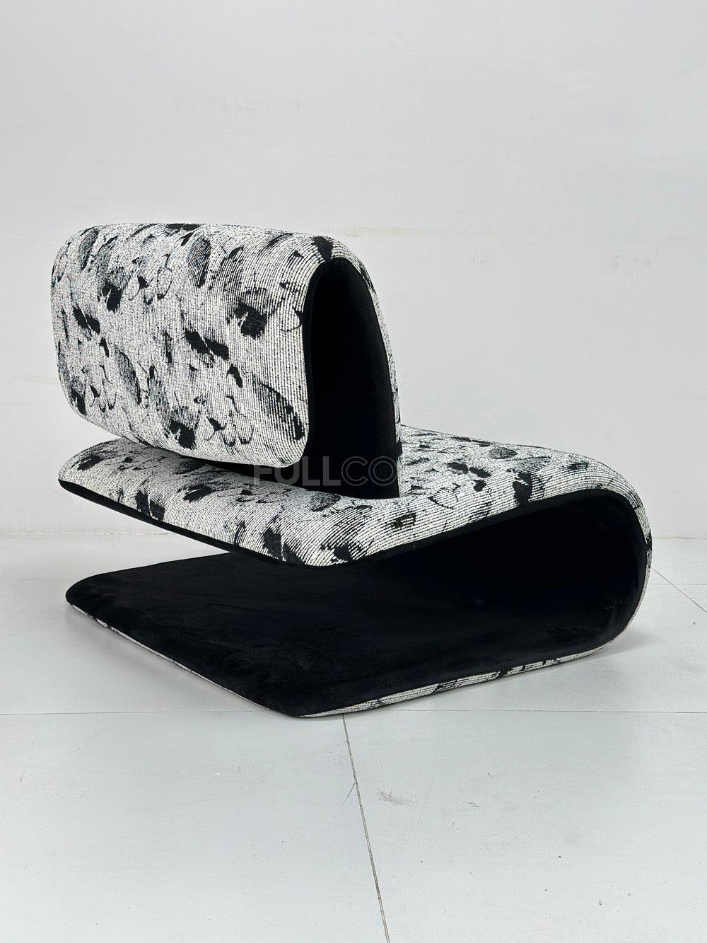 The Scroll Seat Lounge Chair