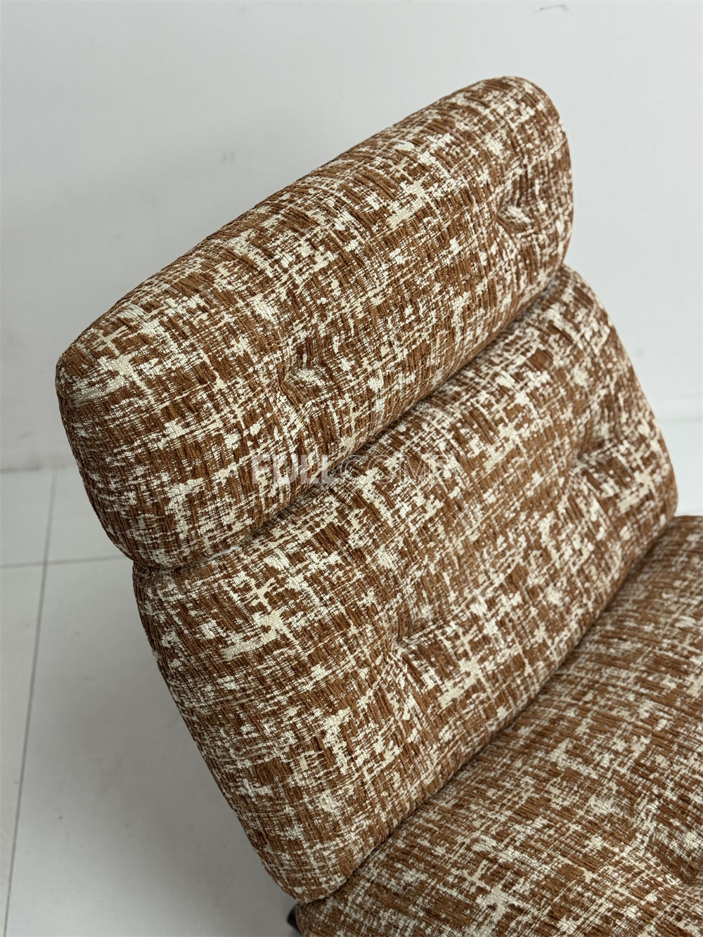 The Roll Head Lounge Chair