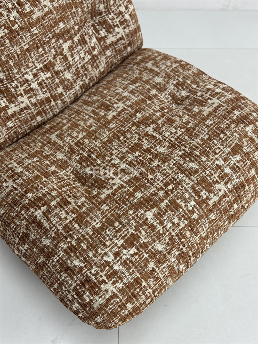 The Roll Head Lounge Chair