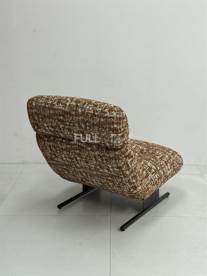 The Roll Head Lounge Chair